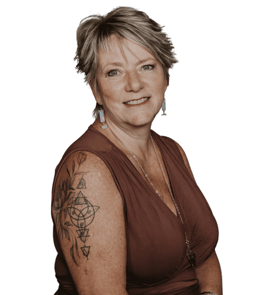 Portrait of Tania Meacher, founder of Creative Witch Designs, against a dark background with gold geometric artwork.